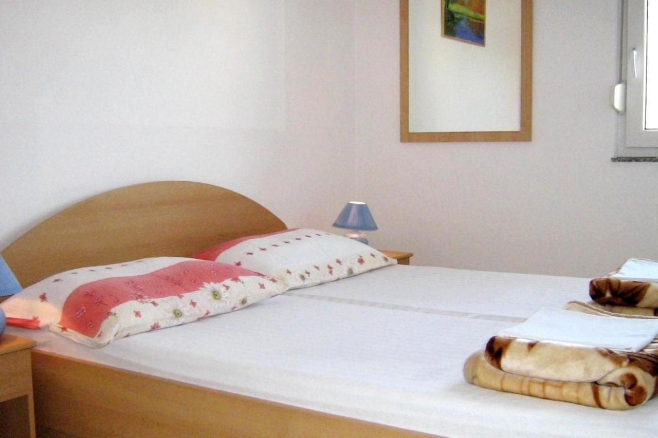 Family Friendly Apartments With A Swimming Pool Businci, Ciovo - 11232 โตรกีร์ ภายนอก รูปภาพ