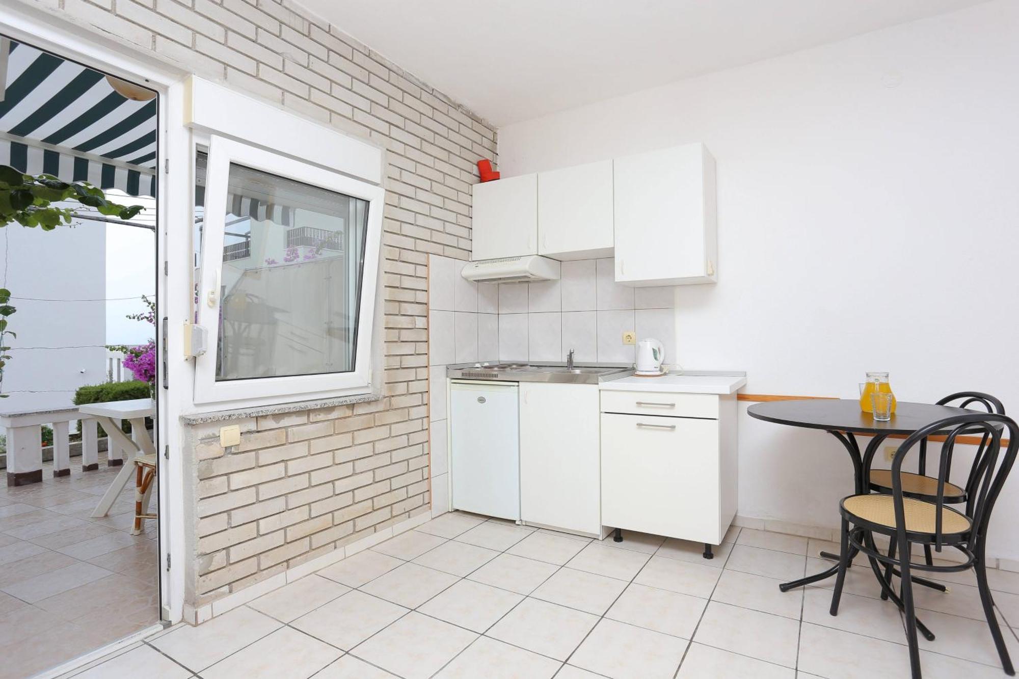 Family Friendly Apartments With A Swimming Pool Businci, Ciovo - 11232 โตรกีร์ ภายนอก รูปภาพ
